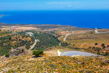curvy road near Chora Sfakion town on Crete, Greeceの写真素材