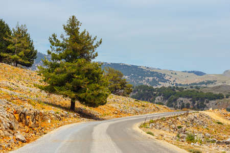 curvy road near Chora Sfakion town on Crete, Greeceの写真素材