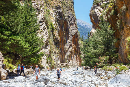 Samaria Gorge, Grece - MAY 26, 2016: Tourists hike in Samaria Gorge in central Crete, Greece. The national park is a UNESCO Biosphere Reserve since 1981のeditorial素材