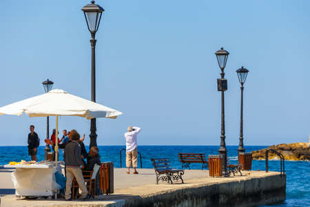 Chania, Crete - 23 Maj, 2016: View of the old harbor of Chania on Crete, Greece. Chania is the second largest city of Crete.のeditorial素材