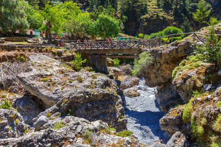 Samaria Gorge, Greece - MAY 26, 2016: Tourists hike in Samaria Gorge in central Crete, Greece. The national park is a UNESCO Biosphere Reserve since 1981のeditorial素材