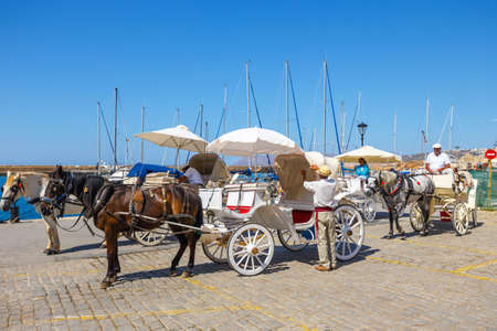 Chania, Crete - 23 Maj, 2016: View of the old harbor of Chania on Crete, Greece. Chania is the second largest city of Crete.のeditorial素材