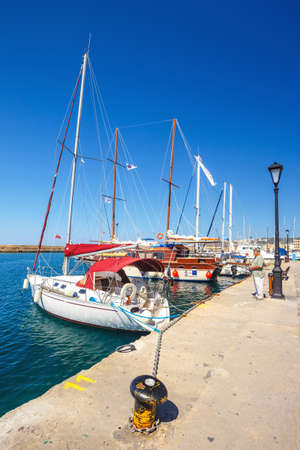 Chania, Crete - 23 Maj, 2016: Marina in Chania on Crete, Greece. Chania is the second largest city of Crete.のeditorial素材