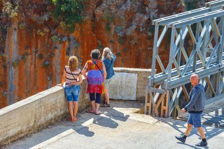 Aradena, Crete, 25 May, 2016: unidentified people visit famous truss bridge over Aradena Gorge on Crete Island, Greeceのeditorial素材