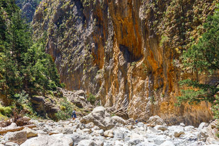 Samaria Gorge, Greece - MAY 26, 2016: Tourists hike in Samaria Gorge in central Crete, Greece. The national park is a UNESCO Biosphere Reserve since 1981のeditorial素材