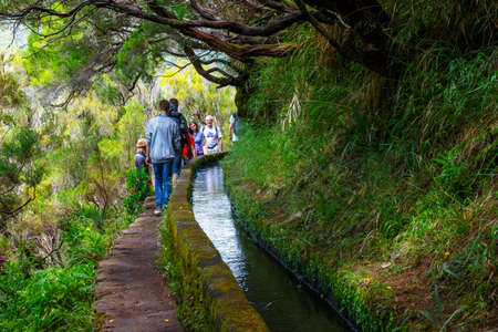 Madeira, Portugal 04 JULY, 2016: Unidentified people walking to Levada Risco, Madeira Island, Portugalのeditorial素材