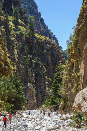 Samaria Gorge, Grece - MAY 26, 2016: Tourists hike in Samaria Gorge in central Crete, Greece. The national park is a UNESCO Biosphere Reserve since 1981のeditorial素材