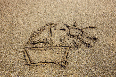 Ship painted on sand beach