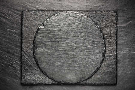 black slate board for serving with copy space, top viewの写真素材