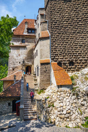 Romania, Bran 16 July, 2014: Tourists admire the Bran Castle also know as Dracula Castle near Brasov, Romania.のeditorial素材
