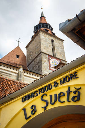BRASOV, ROMANIA - 15 JULY, 2014: Restaurant on the main square of the medieval city of Brasov, main...