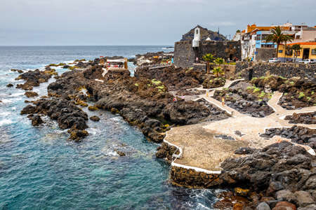 Garachico, Tenerife Island, Spain, 08 JUNE 2015: Natural volcanic pools visited by tourists in Garachico, Tenerife Island, Canary, Spainのeditorial素材