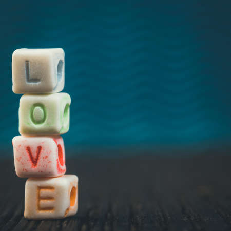 Word Love written in ceramic blocksの写真素材