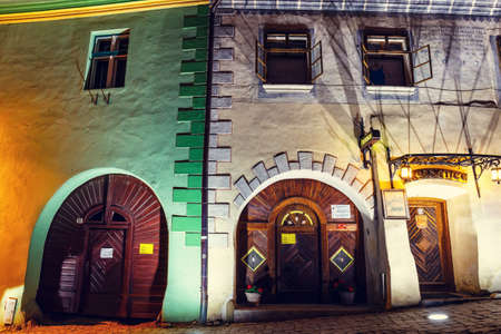 SIGHISOARA, ROMANIA - JULY 07, 2015: Night view of historic town Sighisoara. City in which was born Vlad Tepes, Draculaのeditorial素材