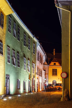 SIGHISOARA, ROMANIA - JULY 07, 2015: Night view of historic town Sighisoara. City in which was born Vlad Tepes, Draculaのeditorial素材