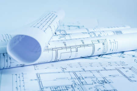Architect rolls and house plans, close upの写真素材