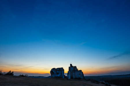 Ruins of medieval castle Mirow in Poland at sunsetの写真素材