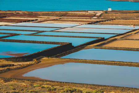 Salinas de Janubio, salt mine at the island of lanzarote, Spainの写真素材