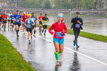 KRAKOW, POLAND - April 30, 2017: Unidentified runners on the street during  16 Cracovia marathon . The marathon is an annual event.のeditorial素材