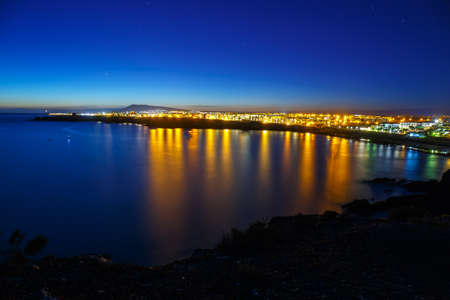 Beautiful sunset over Playa Blanca in Lanzaroteの写真素材