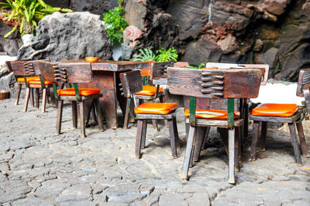 Tables and chairs in volcanic cave in Jameos del Agua, Lanzarote, Canary Islands, Spain