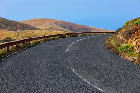 Road in the mountains of Betancuria in the southern part of the Canary island Fuerteventura, Spainの写真素材