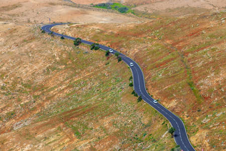 Road in the mountains of Betancuria in the southern part of the Canary island Fuerteventura, Spainの写真素材