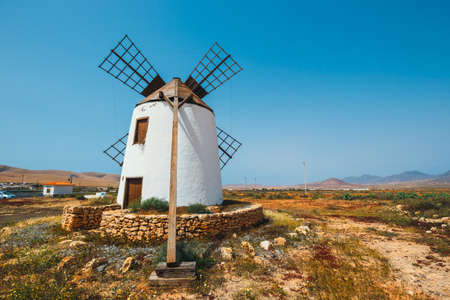 Traditional white stony windmill at Fuertaventura, Canary Islands, Spainの写真素材
