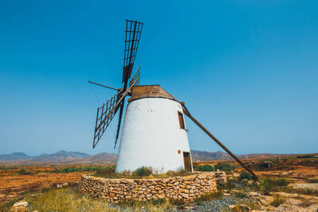 Traditional white stony windmill at Fuertaventura, Canary Islands, Spainの写真素材
