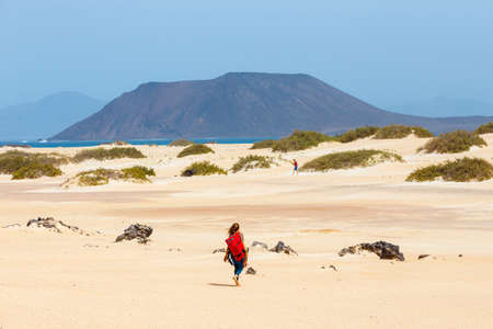 Corralejo, Fuerteventura, April 01, 2017: Unknown male kitesurfer on a beach in Corralejo, Fuerteventura, Canary islands, Spainの写真素材