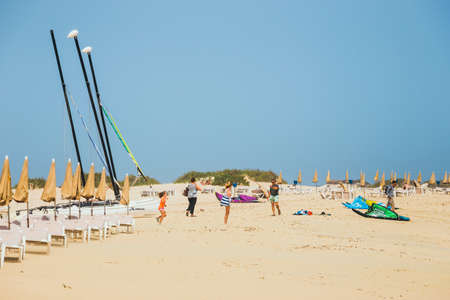 Corralejo, Fuerteventura, April 01, 2017: Unknown people on a beach in Corralejo, Fuerteventura, Canary islands, Spainのeditorial素材