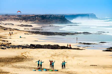 El Cotillo, Fuerteventura, Spain, April 03, 2017: Unknown kitesurfers on a beach in El Cotillo village in Fuerteventura island, Spainのeditorial素材
