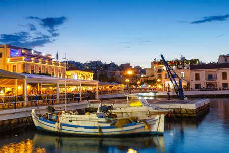 Agios Nikolaos, Crete, Greece - June 08, 2017: Agios Nikolaos town at summer evening. Agios Nikolaos is one of the most touristic cities on Crete island, Greece.のeditorial素材