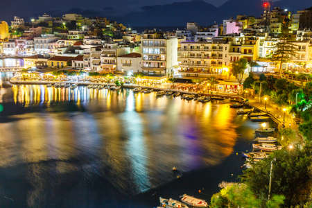 Agios Nikolaos, one of the most touristic cities on Crete island, at summer evening, Greece.のeditorial素材