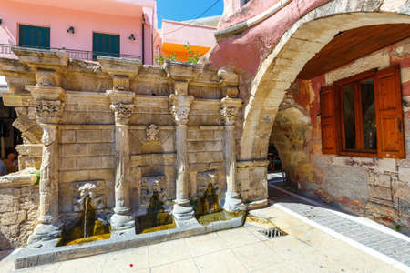 Rethymno, Crete, May 27, 2016: The Rimondi Fountain in the centre of the old town of Rethymnon, Greeceのeditorial素材