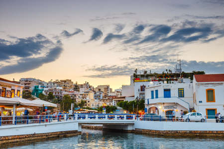 Agios Nikolaos, Crete, Greece - June 08, 2017: Agios Nikolaos town at summer evening. Agios Nikolaos is one of the most touristic cities on Crete island, Greece.のeditorial素材