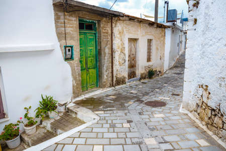 Narrow street in the village of Kritsa near Agios Nikolaos, Crete, Greeceの写真素材