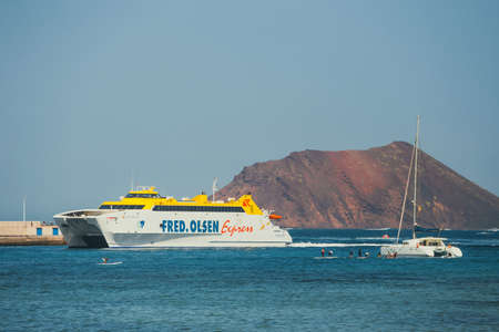 Corralejo, Fuertevetura Island, Spain - April 01, 2017: The skyline of Corralejo with the port and boats in itのeditorial素材