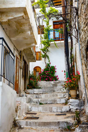 Narrow street in the village of Kritsa near Agios Nikolaos, Crete, Greeceの写真素材