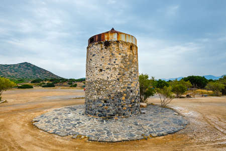 Ancient windmill on Kalydon Peninsula near Agios Nikolaos, Crete, Greeceの写真素材