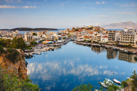 Agios Nikolaos, Crete, Greece - June 08, 2017: Agios Nikolaos town at summer afternoon. Agios Nikolaos is one of the most touristic cities on Crete island, Greeceのeditorial素材