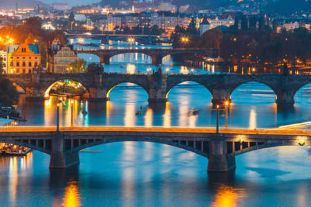 View of  bridges with historic Charles Bridge and Vltava river at night in Prague, Czech Republicのeditorial素材
