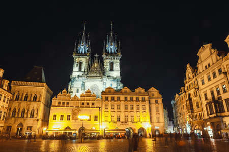 Prague, Czech Republic, September 30, 2017: Unrecognizable tourists walking on  Old Town Hall at night in Pragueのeditorial素材