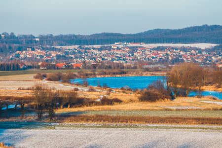 beautiful winter landscape with hoarfrost covered fieldの写真素材