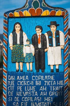 SAPANTA,ROMANIA - 04 JULY, 2015- Painted wooden crosses in the famous Merry Cemetery in Maramures,...