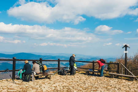 Zawoja, Poland - May 03, 2015: Hikers travel in the Babia Gora Mountain with a backpackのeditorial素材