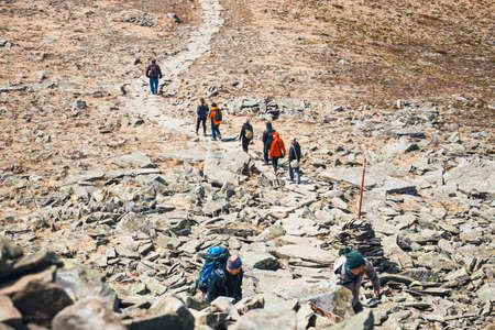 Zawoja, Poland - May 03, 2015: Hikers travel in the Babia Gora Mountain with a backpackのeditorial素材