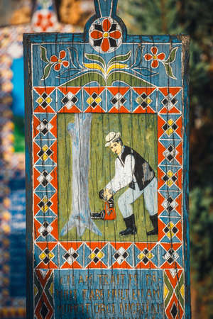 SAPANTA,ROMANIA - 04 JULY, 2015- Painted wooden crosses in the famous Merry Cemetery in Maramures, those cemetery is unique in Romania and in the worldのeditorial素材