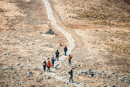 Zawoja, Poland - May 03, 2015: Hikers travel in the Babia Gora Mountain with a backpackのeditorial素材