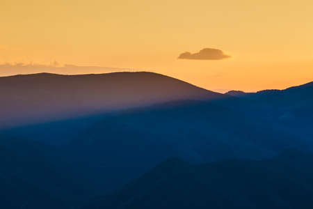 Beautiful sunset over Parang Mountains in Romaniaの写真素材
